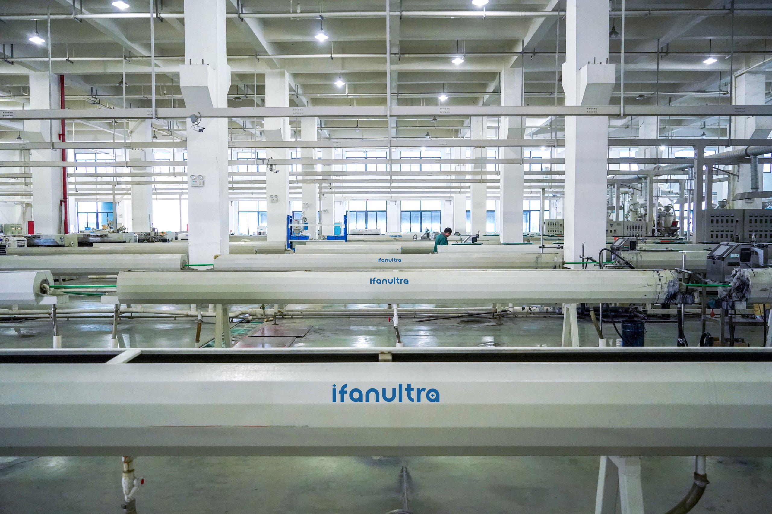 PP-R extrusion lines with cooling tanks running the length of the IFAN ULTRA pipe hall
