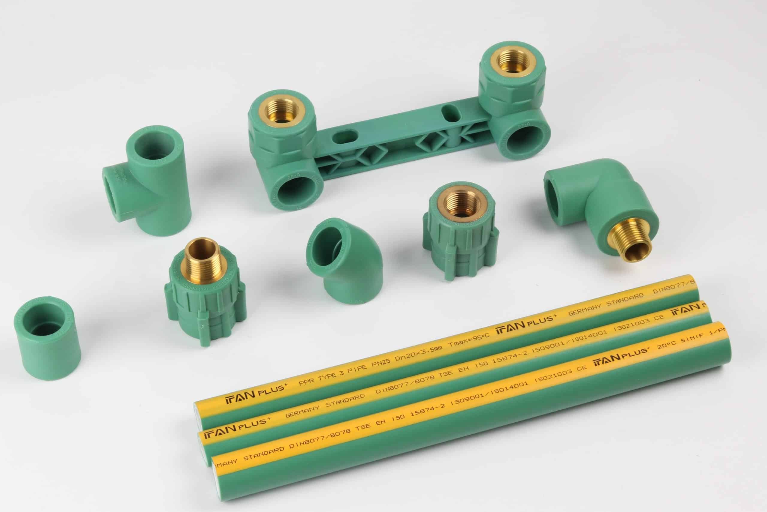 Green PP-R pipe lengths and fittings whose printed marking string cites PPR TYPE 3 PIPE, GERMANY STANDARD DIN 8077/8078 and EN ISO 15874-2