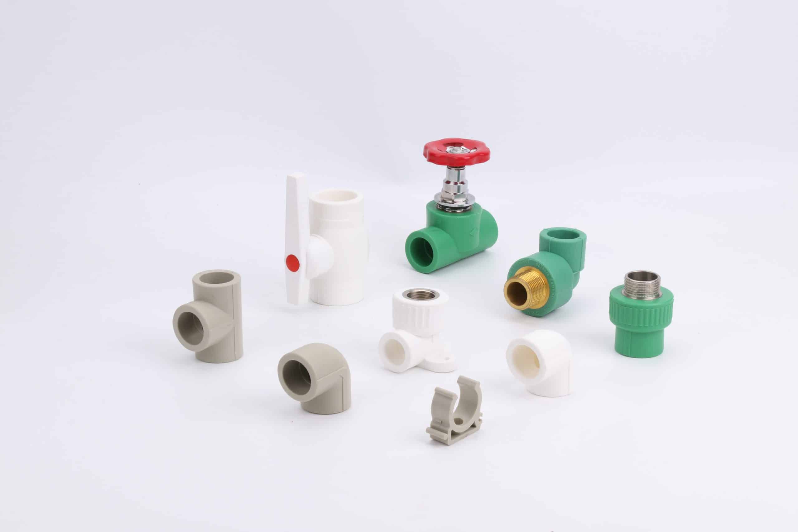Assortment of PPR fittings including elbows tees and sockets for heat fusion
